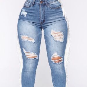 Fringe women’s medium wash jeans